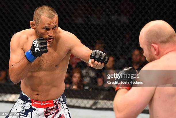 Dan Henderson circles Tim Boetsch in their middleweight bout during the UFC event at the Smoothie King Center on June 6, 2015 in New Orleans,...