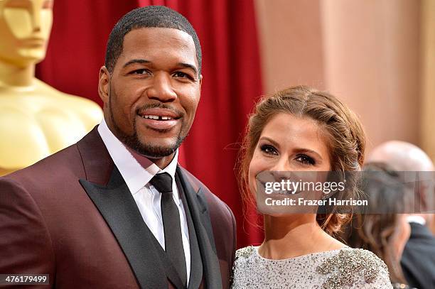 Personalities Michael Strahan and Maria Menounos attend the Oscars held at Hollywood & Highland Center on March 2, 2014 in Hollywood, California.