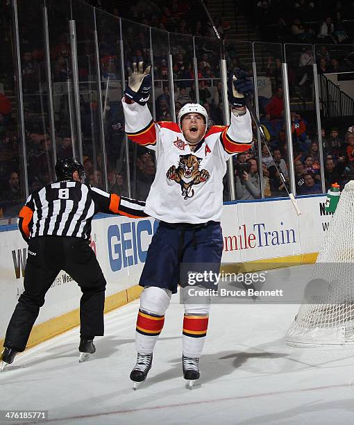 Scottie Upshall of the Florida Panthers celebrates his goal at 10:32 of the third period against the New York Islanders at the Nassau Veterans...