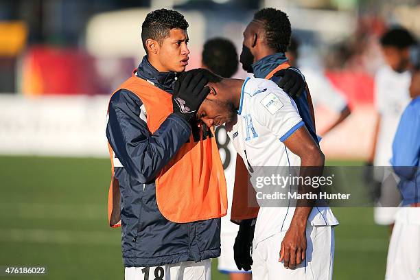 Dabirson Castillo is consoled by Marcelo Pereira both of Honduras after the FIFA U20 World Cup New Zealand 2015 Group F match between Honduras and...