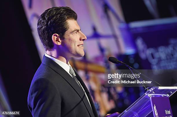 Host Max Greenfield speaks at the 14th annual Chrysalis Butterfly Ball sponsored by Audi, Kayne Anderson, Lauren B. Beauty and Z Gallerie on June 6,...