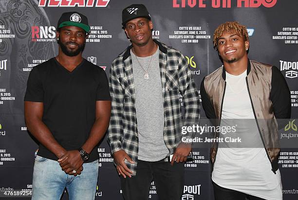 Jaiquawn Jarrett, Geno Smith and Buster Skine attend the Roc Nation Sports Miguel Cotto Vs Daniel Geale Fight at Barclays Center on June 6, 2015 in...