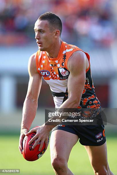 Tom Scully of the Giants looks to kick during the round 10 AFL match between the Greater Western Sydney Giants and the Brisbane Lions at Spotless...