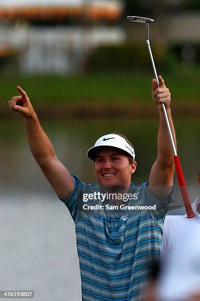 Russell Henley reacts after winning a four-way playoff hole to defeat Rory McIlroy of Northern Ireland, Russell Knox, and Ryan Palmer (all not to win...