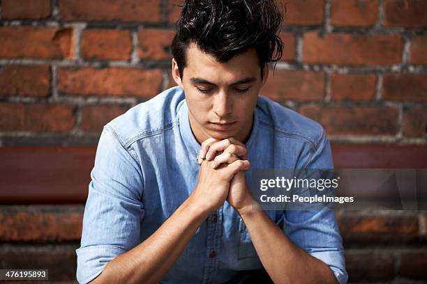 looking for reassurance - praying stock pictures, royalty-free photos & images