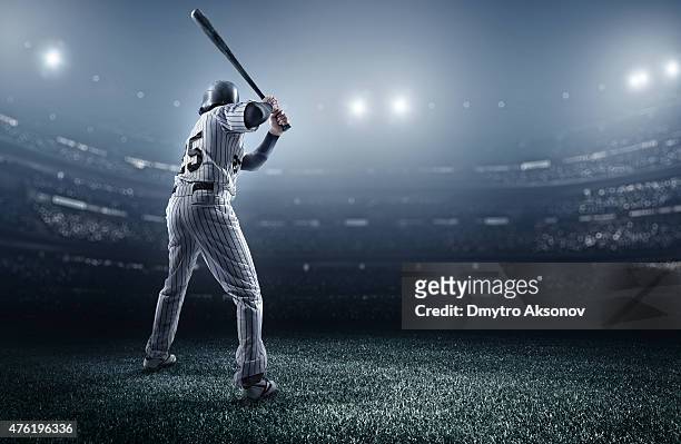 baseball player in stadium - baseball sport stock pictures, royalty-free photos & images