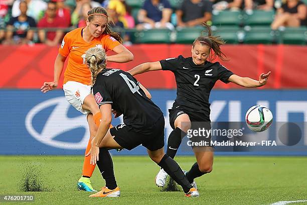 Lieke Martens of Netherlands scores a goal between Ria Percival of New Zealand and Katie Duncan during the FIFA Women's World Cup Canada 2015 Group A...