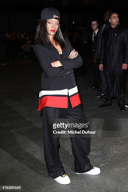 Rihanna attends the Givenchy show as part of the Paris Fashion Week Womenswear Fall/Winter 2014-2015 on March 2, 2014 in Paris, France.