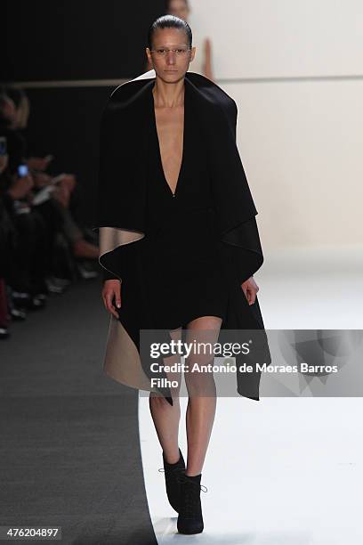 Model walks the runway during the Akris show as part of the Paris Fashion Week Womenswear Fall/Winter 2014-2015 on March 2, 2014 in Paris, France.