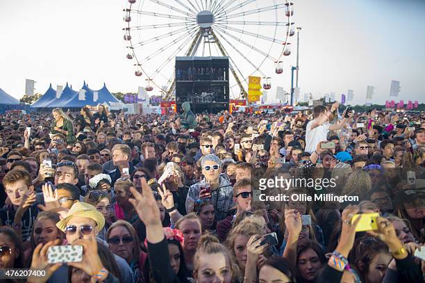 The crowd watch on as Disclosure perform onstage hedadlining day 1 of Parklife Festival at Heaton Park on June 6, 2015 in Manchester, United Kingdom