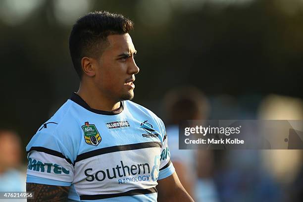 Sosaia Feki of the Sharks watches on during the round 13 NRL match between the Sharks and the Roosters at Remondis Stadium on June 7, 2015 in Sydney,...