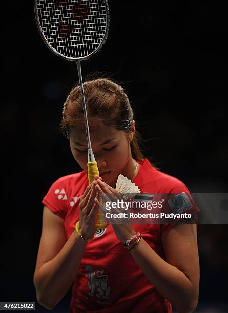 Ratchanok Intanon of Thailand reacts after winning Women's Final against Yui Hashimoto of Japan during the 2015 BCA Indonesia Open at Istora Senayan...