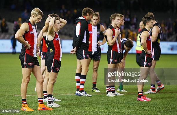 Nick Riewoldt of the Saints and teamates stand during presentation after their defeat during the round 10 AFL match between the St Kilda Saints and...