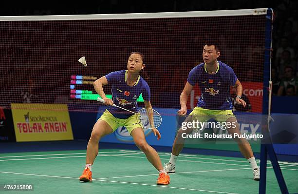 Xu Chen and Ma Jin of China return a shot against Zhang Nan and Zhao Yunlei of China during Mixed Double's Final of the 2015 BCA Indonesia Open at...