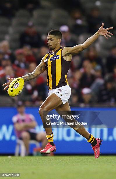 Bradley Hill of the Hawks kicks the ball during the round 10 AFL match between the St Kilda Saints and the Hawthorn Hawks at Etihad Stadium on June...