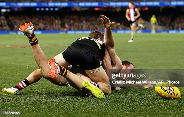 Jarryd Roughead of the Hawks and Jimmy Webster of the Saints compete for the ball during the 2015 AFL round ten match between the St Kilda Saints and...