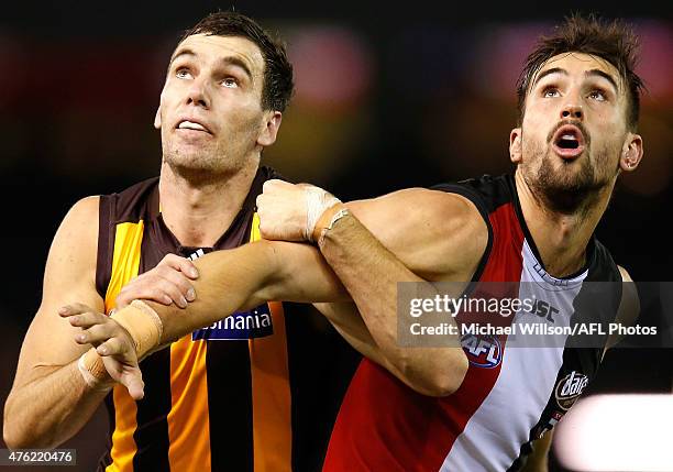 Jonathon Ceglar of the Hawks and Billy Longer of the Saints compete in a ruck contest during the 2015 AFL round ten match between the St Kilda Saints...