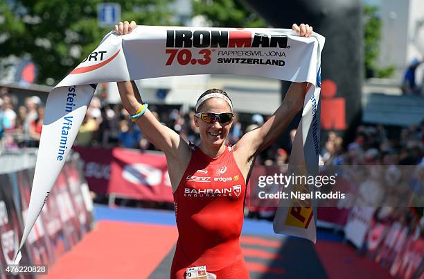 Daniela Ryf of Switzerland celebrates winning the women's race during the Ironman 70.3 Rapperswil-Jona on June 7, 2015 in Rapperswil, Switzerland.