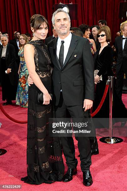 Director Alfonso Cuaron and writer Sheherazade Goldsmith attend the Oscars held at Hollywood & Highland Center on March 2, 2014 in Hollywood,...