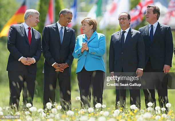 Canada's Prime Minister Stephen Harper, U.S. President Barack Obama, German Chancellor Angela Merkel, French President Francois Hollande and British...