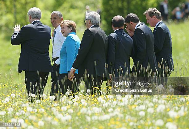 Canada's Prime Minister Stephen Harper, U.S. President Barack Obama, German Chancellor Angela Merkel, European Commission Jean-Claude Juncker, French...