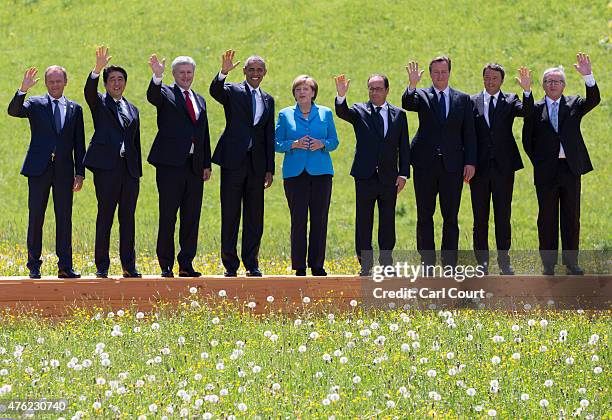 President of the European Council Donald Tusk, Japanese Prime Minister Shinzo Abe, Canada's Prime Minister Stephen Harper, U.S. President Barack...