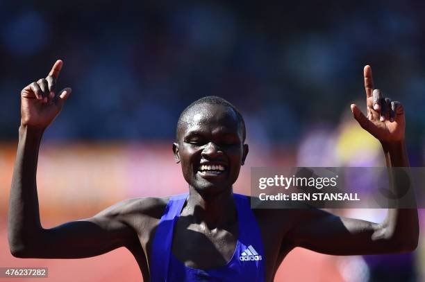 Kenya's Thomas Pkemei Longosiwa celebrates after winning the men's 5000m during the IAAF Diamond League Birmingham Grand Prix athletics meeting at...