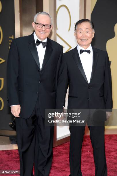 Actor George Takei and Brad Altman attend the Oscars held at Hollywood & Highland Center on March 2, 2014 in Hollywood, California.