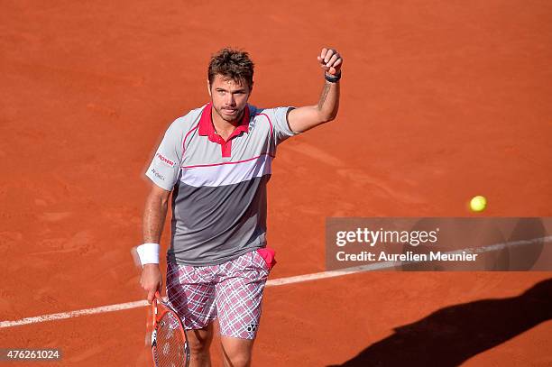 Stanislas Wawrinka of Switzerland reacts during his Men's final match against Novak Djokovic of Serbia on day fifteen of the 2015 French Open at...