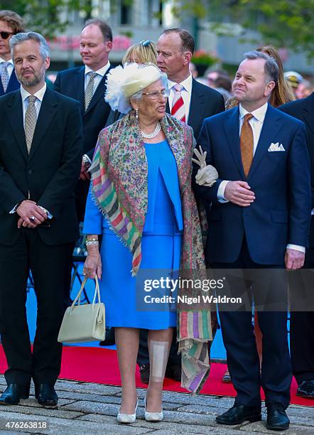 Ari Mikael Behn of Norway, Princess Astrid of Norway, Olemic Thommessen of Norway attend the unveiling of a statue of King Olav V at the City Hall...