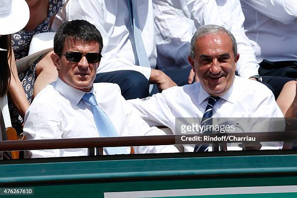 French Prime Minister Manuel Valls and President of French Tennis Federation Jean Gachassin attend the Men Final of 2015 Roland Garros French Tennis...