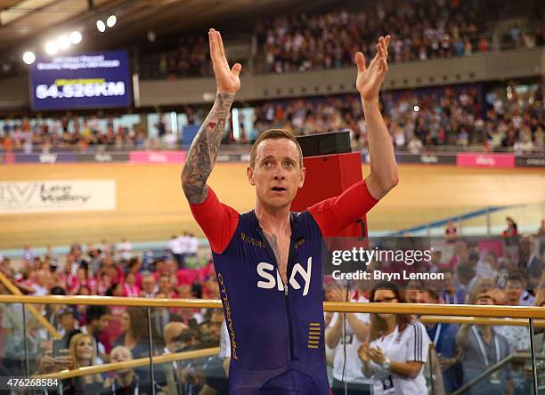 Sir Bradley Wiggins of Great Britain and Team Wiggins celebrates breaking the UCI One Hour Record at Lee Valley Velopark Velodrome on June 7, 2015 in...