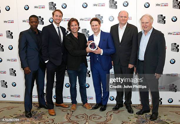 Presenter Adrian Lester with Oliver Chris, Rupert Goold, Richard Goulding Mike Bartlett and Tim Pigott-Smith winners of the Best Theatre award for...