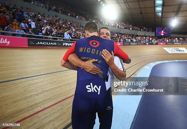 Sir Bradley Wiggins of Great Britain and Team Wiggins is congratulated by coach Heiko Salzwedel after breaking the UCI One Hour Record at Lee Valley...