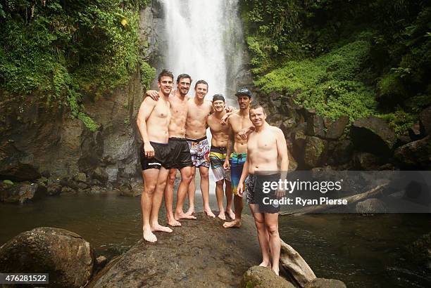 Mitch Marsh, Mitchell Starc, Josh Hazlewood, Shane Watson, Mitchell Johnson and Peter Siddle of Australia pose in front of Trafalgar Falls during the...