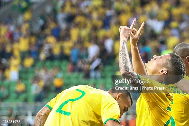 Philippe Coutinho of Brazil celebrates after scoring the opening goal during a friendly match between Brazil and Mexico at Allianz Parque Stadium on...