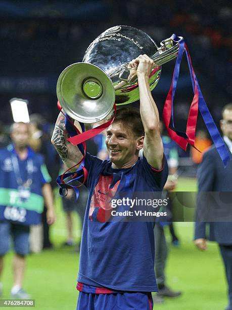 Lionel Messi of FC Barcelona with Champions League trophy during the UEFA Champions League final match between Barcelona and Juventus on June 6, 2015...