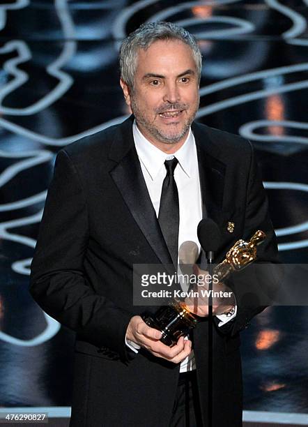 Director Alfonso Cuaron accepts the Best Achievement in Directing award for 'Gravity' onstage during the Oscars at the Dolby Theatre on March 2, 2014...