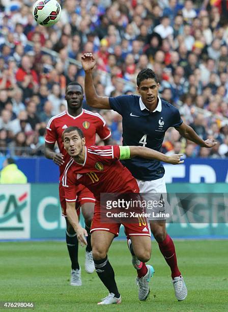 Captain Eden Hazard of Belgium in action with Raphael Varane of France during the International Friendly games between France and Belgium at Stade de...
