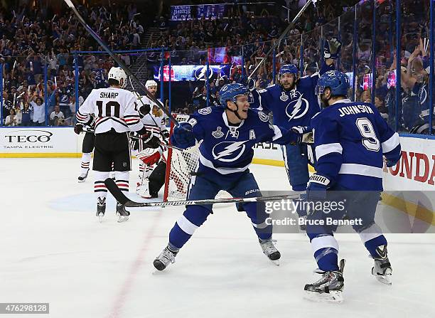 Ondrej Palat, Nikita Kucherov and Tyler Johnson of the Tampa Bay Lightning celebrate Johnson's goal during the second period against the Chicago...