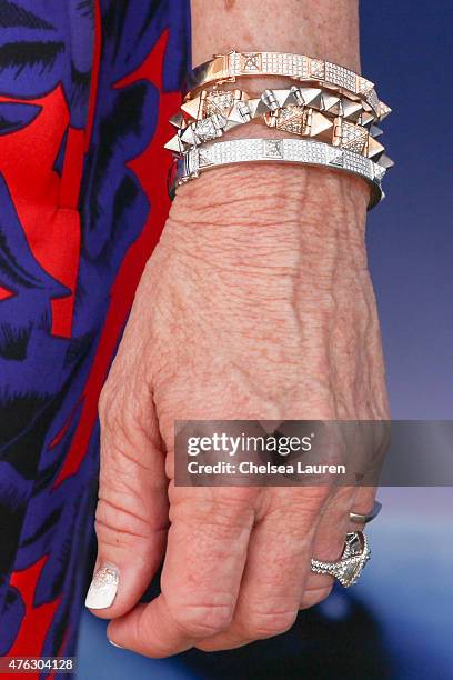 Personality Kyle Richards, bracelet detail, attends the opening night of 'Matilda the Musical' at Ahmanson Theatre on June 7, 2015 in Los Angeles,...