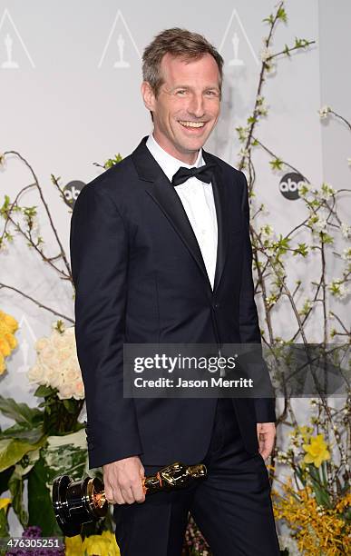 Director Spike Jonze, winner of Best Writing, Screenplay Written Directly for the Screen poses in the press room during the Oscars at Loews Hollywood...