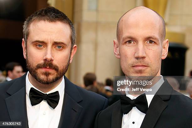 Jeremy Scahill and Rick Rowley attend the 86th Oscars held at Hollywood & Highland Center on March 2, 2014 in Hollywood, California.