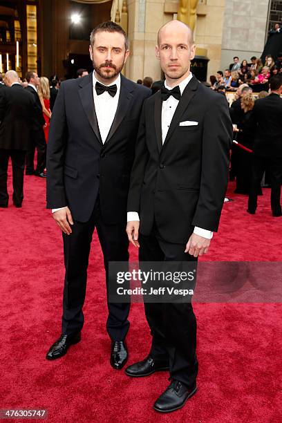 Jeremy Scahill and Rick Rowley attend the 86th Oscars held at Hollywood & Highland Center on March 2, 2014 in Hollywood, California.