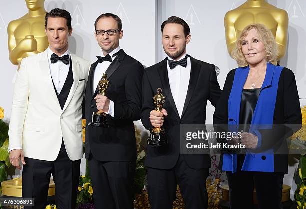Actor Matthew McConaughey, film maker Laurent Witz, producer Alexandre Espigar and actress Kim Novak pose in the press room during the Oscars at...
