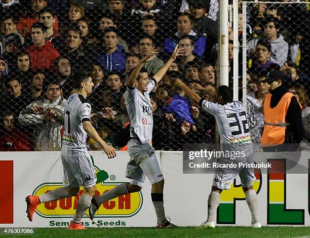 Jacobo Guillermo Mansilla of Olimpo celebrates with teammates after scoring the opening goal during a match between Olimpo and River Plate as part of...