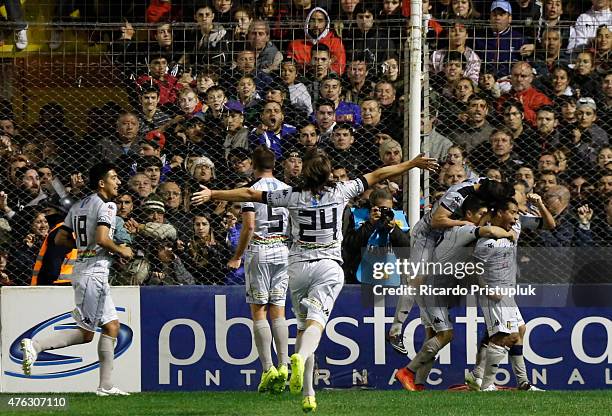 Jacobo Guillermo Mansilla of Olimpo celebrates with teammates after scoring the opening goal during a match between Olimpo and River Plate as part of...