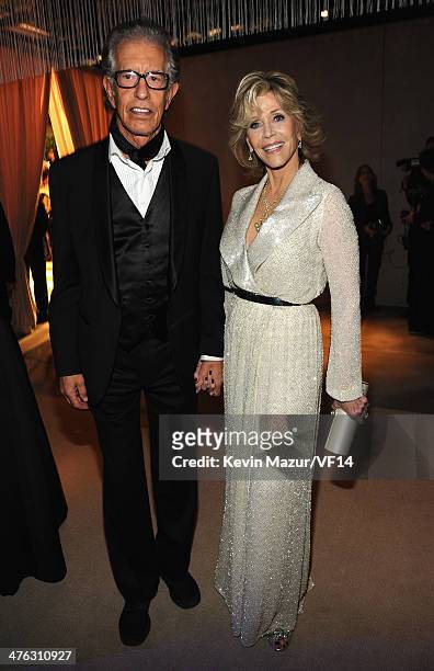 Richard Perry and Jane Fonda attend the 2014 Vanity Fair Oscar Party Hosted By Graydon Carter on March 2, 2014 in West Hollywood, California.