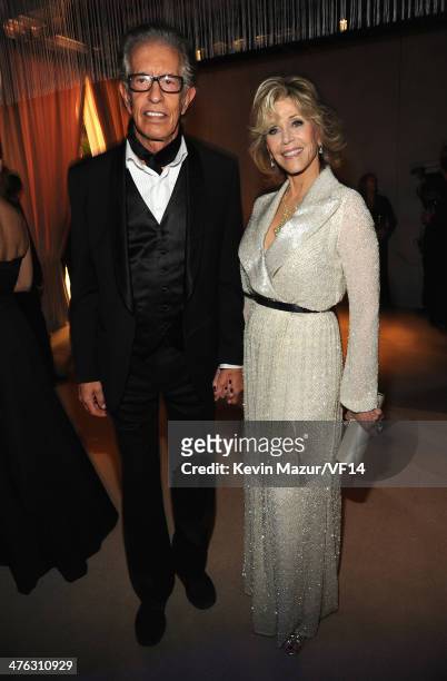 Richard Perry and Jane Fonda attend the 2014 Vanity Fair Oscar Party Hosted By Graydon Carter on March 2, 2014 in West Hollywood, California.