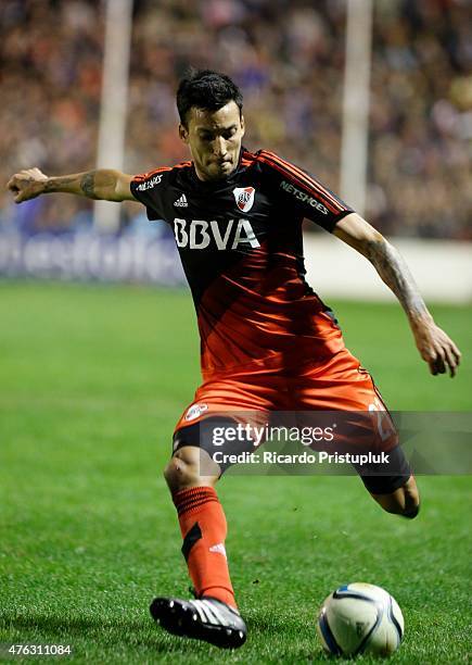 Leonel Vangioni of River Plate kicks the ball during a match between Olimpo and River Plate as part of 15th round of Torneo Primera Division 2015 at...